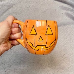 Handpainted ceramic Halloween mug.